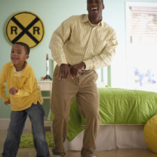 Father and Son Dancing Together