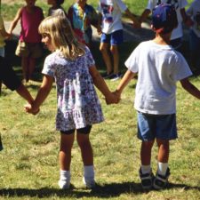 Children Practicing Holding Hands