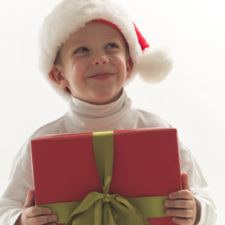Young Boy Holding Christmas Gift 002