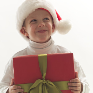 Young Boy Holding Christmas Gift 001
